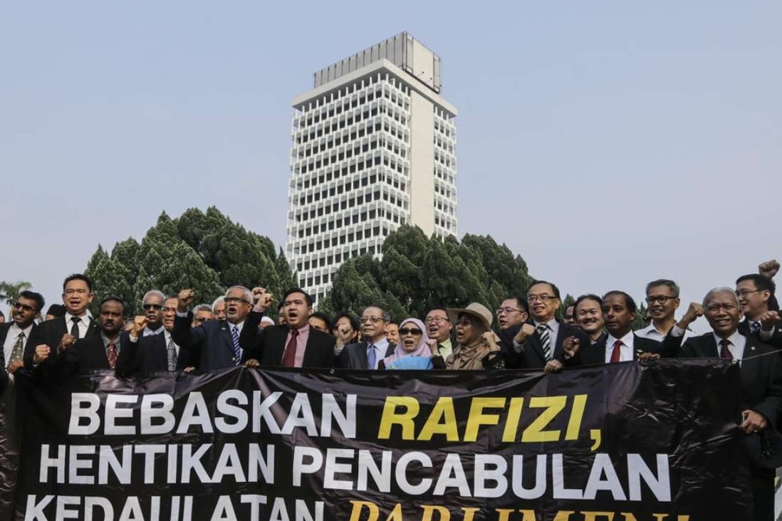 Malaysian opposition lawmaker charged over 1MDB leaks  South 