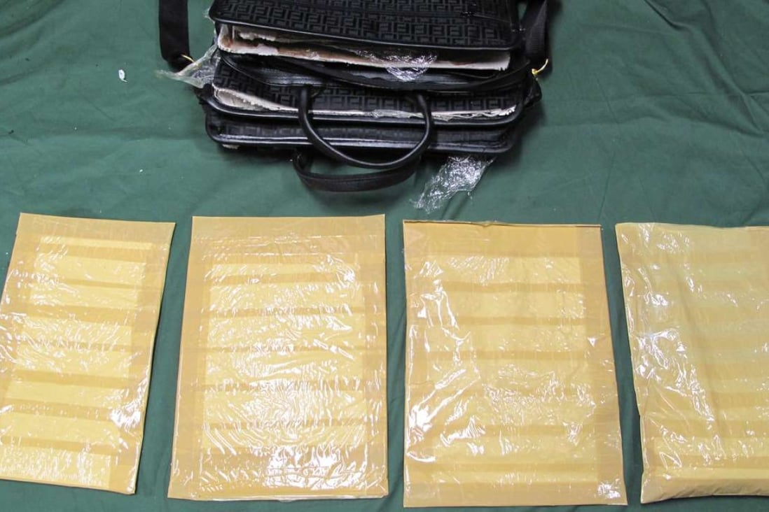 A seizure of cocaine, hidden inside a false briefcase compartment, at Hong Kong International Airport in February 2015. Photo: SCMP Pictures