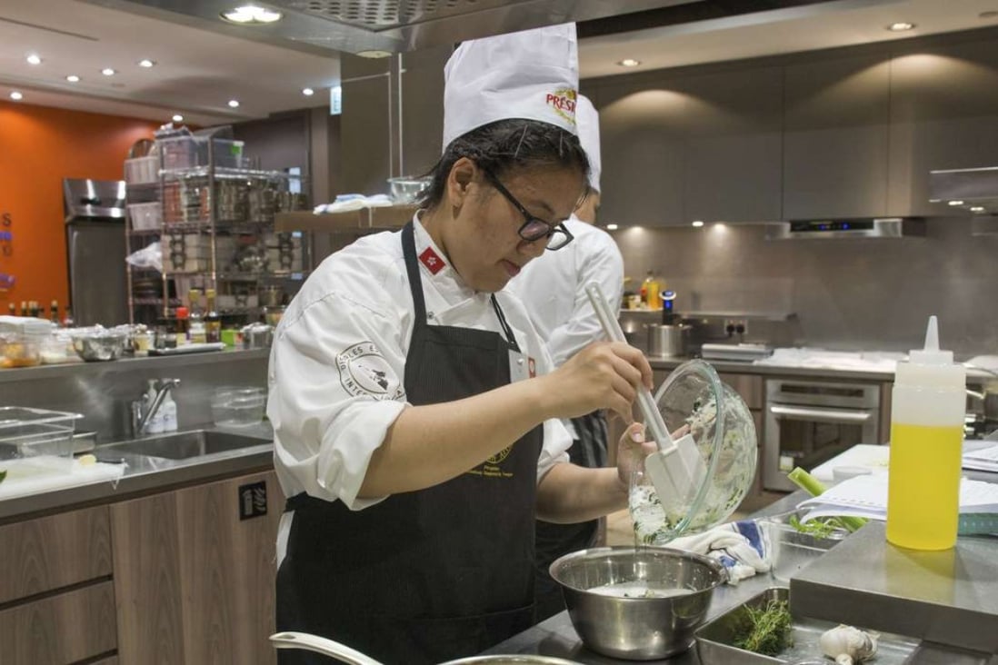Secondary school student Celia Ho takes part in the Disciples Escoffier Young Talent Trophy Hong Kong selection, held at Towngas Cooking Centre, Causeway Bay.
