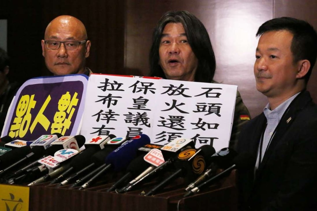 Albert Chan Wai-yip (left), "Long Hair" Leung Kwok-hung, and Raymond Chan Chi-chuen addressing the media after a Legco meeting on the copyright bill in January. Photo: Nora Tam