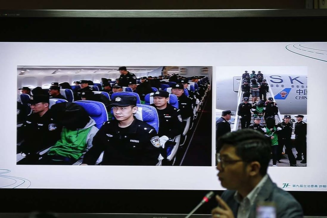 Images of the 45 Taiwanese deported to mainland China from Kenya are displayed on a screen as Taiwanese legislators debate the incident. Photo: EPA