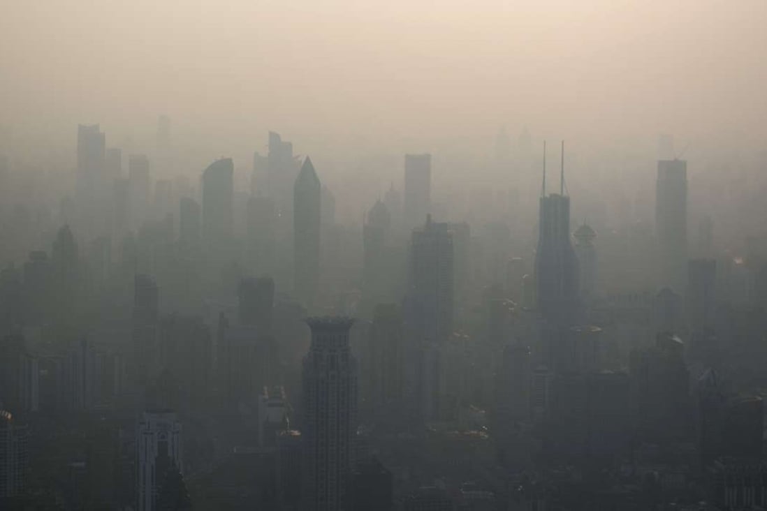 Shanghai’s skyline is barely visible on a badly polluted day last month. Photo: AFP