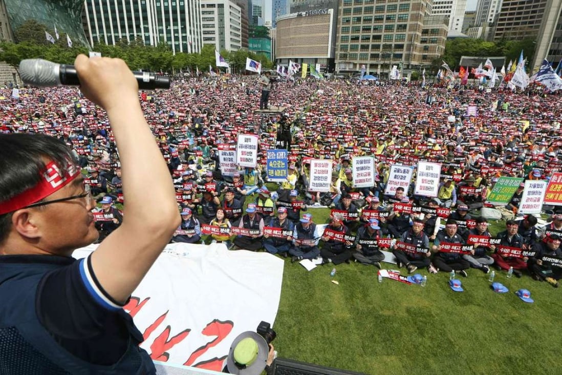 The protesters reject labour reforms being pushed by the government. Photo: AFP