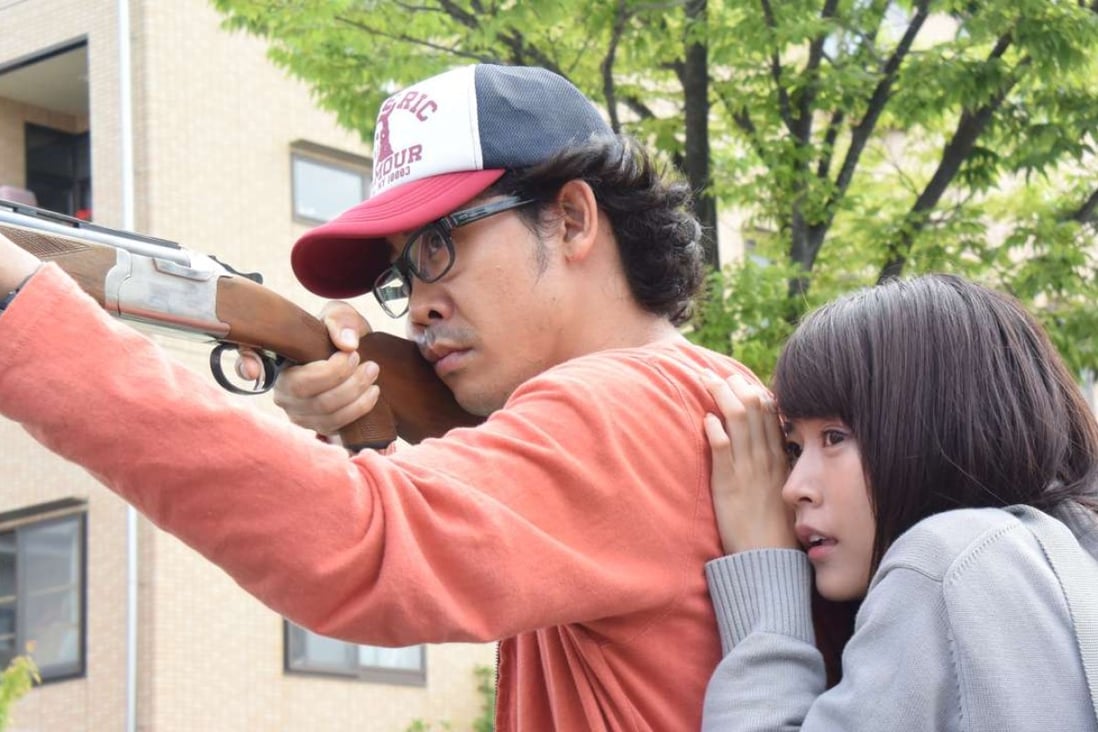 Yo Oizumi (left) and Katsumi Arimura run away from a virus-plagued city in I Am a Hero (category III; Japanese), directed by Shinsuke Sato.