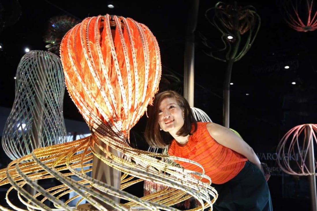 Textile artist Elaine Ng poses with her Sundew sculptures at Art Central in Central, Hong Kong. Photo: Nora Tam