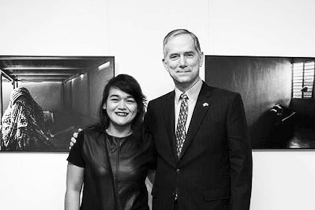 Xyza Bacani with Clifford Hart, US consul general to Hong Kong and Macau. The US consulate is the sponsor of Human Slavery, Bacani’s current solo exhibition. Photo: Lawrence Ng