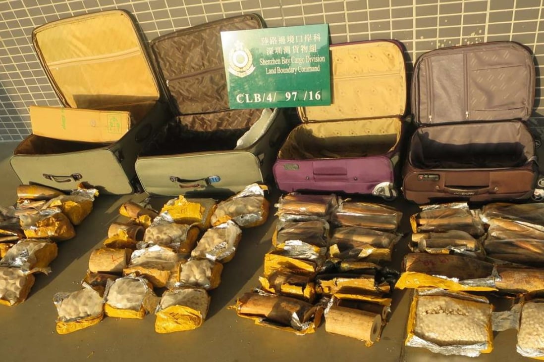 The haul was discovered when customs officers intercepted an outgoing seven-seater car at the Shenzhen Bay Immigration Control Point on Thursday afternoon. Photo: SCMP Pictures