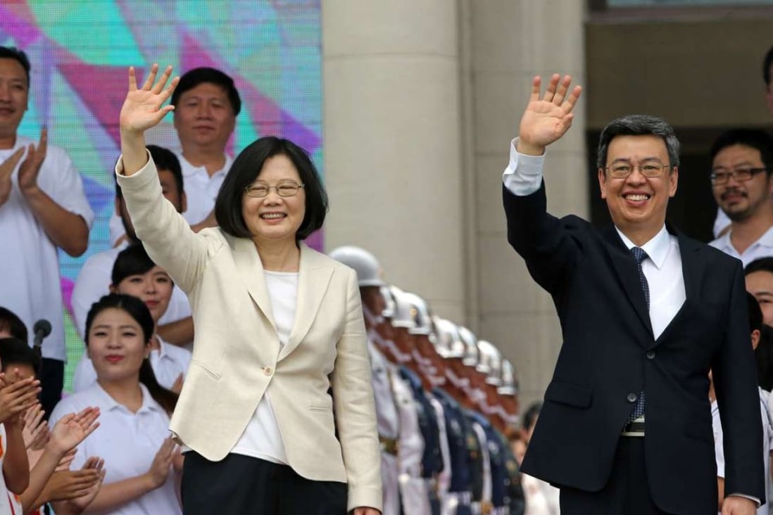 Taiwan’s new President Tsai Ing-wen (left) and Vice-President Chen Chien-jen wave during Tsai’s inauguration ceremony in Taipei, Taiwan, on Friday. Photo: Felix Wong