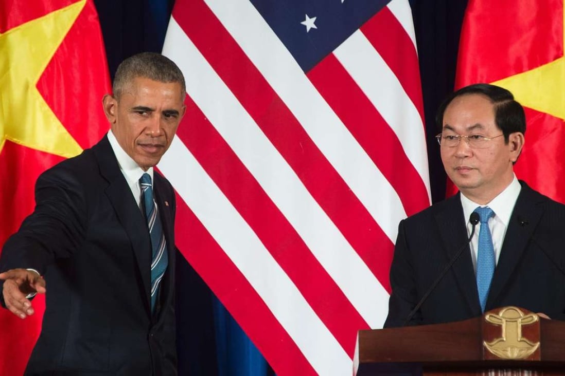 US President Barack Obama and Vietnam's President Tran Dai Quang (R) at joint press conference in Hanoi. Photo: AFP