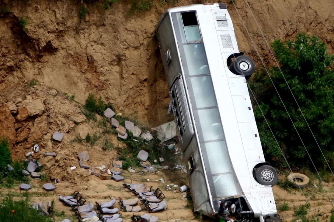 Dozens were killed when a bus fell into a valley in Chunhua county in Xianyang, Shaanxi province, in May 2015. Road accidents kill an estimated 260,000 people each year in China, according to the WHO. Photo: Reuters