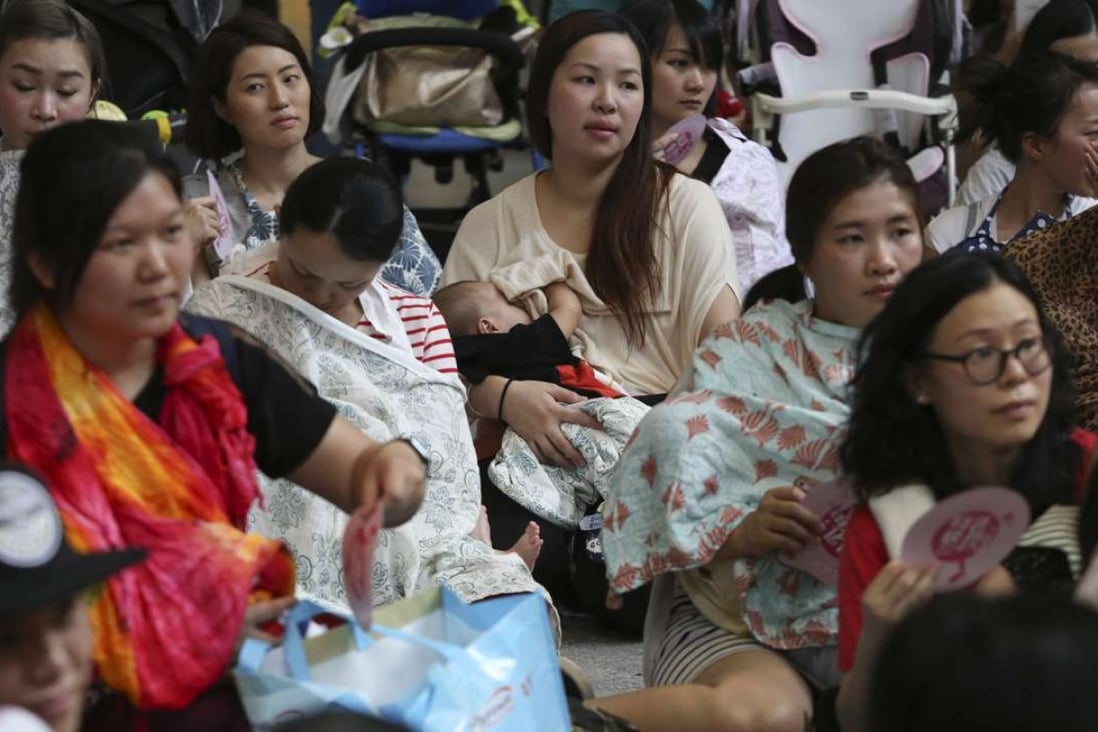 Breastfeeding mothers in a flash mob protest at Tai Wai MTR station. Photo: Sam Tsang