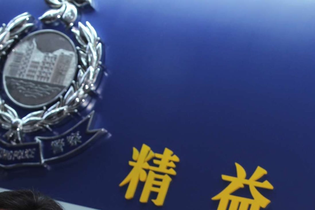 The logo of the Hong Kong police headquarters in Wan Chai as an Indian teenager loses a discrimination case against the police force. Photo: Edward Wong