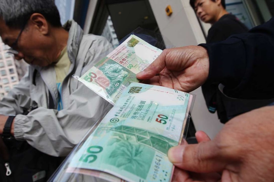 Stacks of Hong Kong dollar bills are shown in the city as a large civil service allowance is set to grow sharply in the years ahead. Photo: Felix Wong