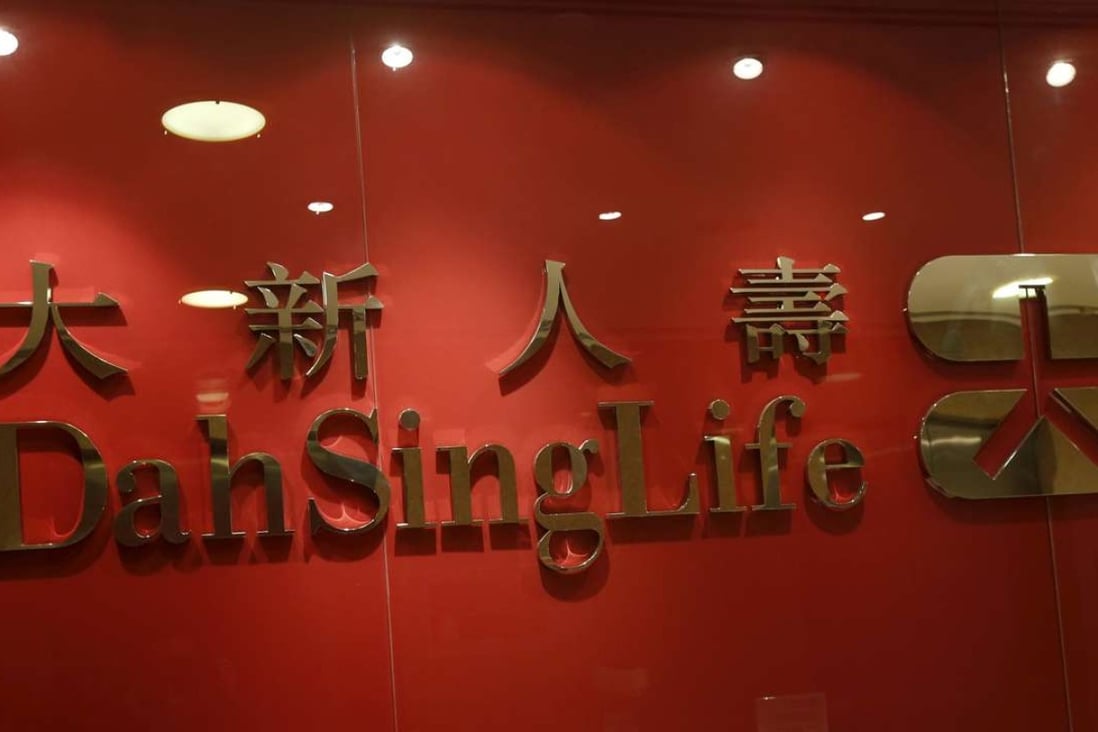 A company logo of Dah Sing Life is displayed at the reception of its office in Hong Kong. Photo Reuters, Bobby Yip