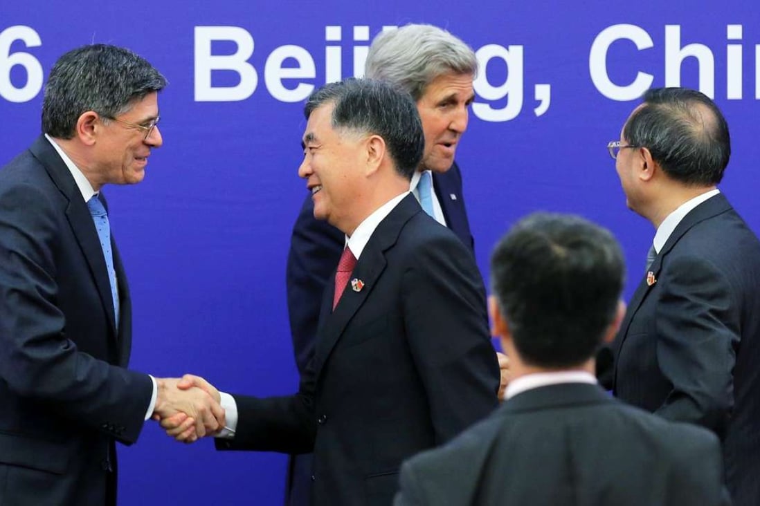 US Treasury Secretary Jack Lew (left), US Secretary of State John Kerry (centre back), China’s Vice-Premier Wang Yang (centre front) and China’s State Councillor Yang Jiechi greet each other after the closing ceremony of the US-China Strategic and Economic Dialogue in Beijing. Photo: Reuters