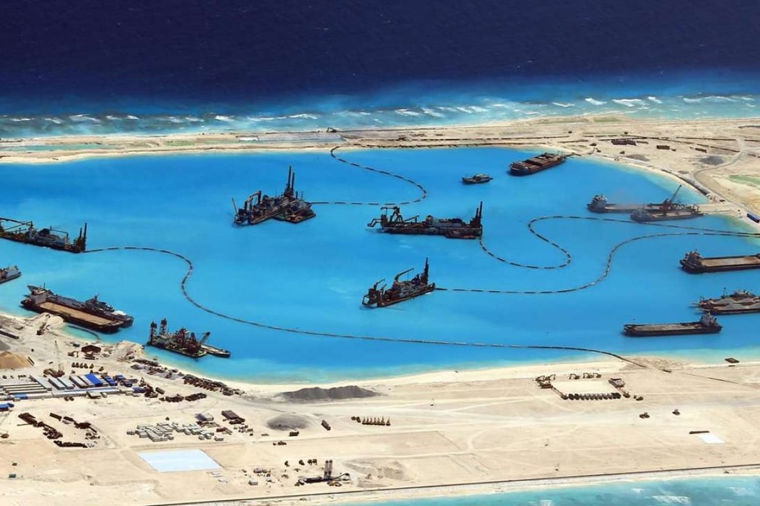 Chinese reclamation work at Fiery Cross Reef in the disputed Spratly Islands in the South China Sea in February 2015. Photo: EPA/Armed Forces of the Philippines