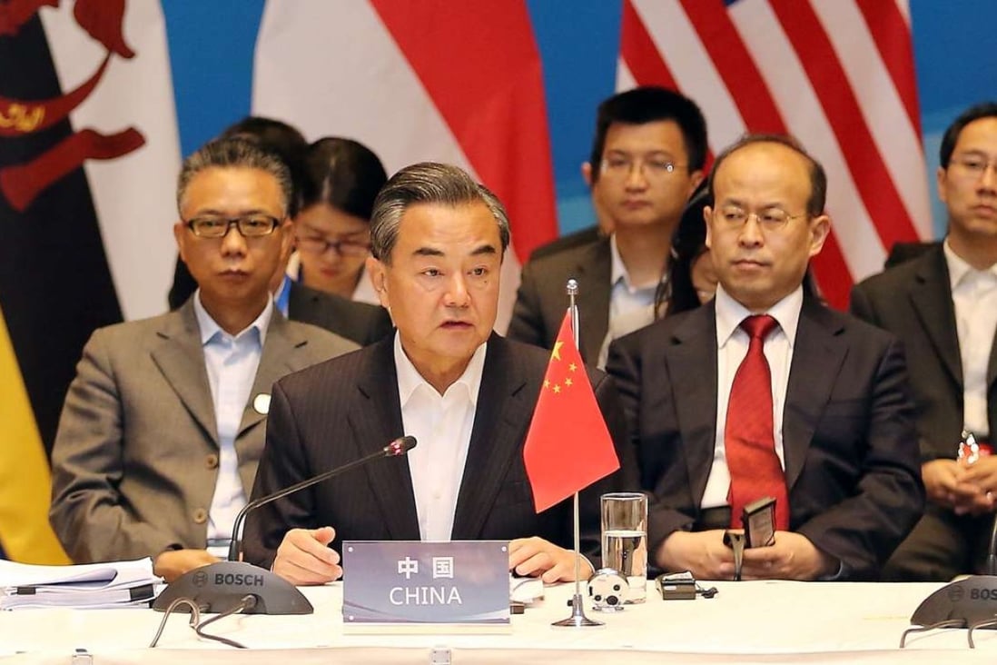 China's Foreign Minister Wang Yi (centre) speaks during Tuesday’s Special Asean-China Foreign Ministers' Meeting. Photo: Reuters