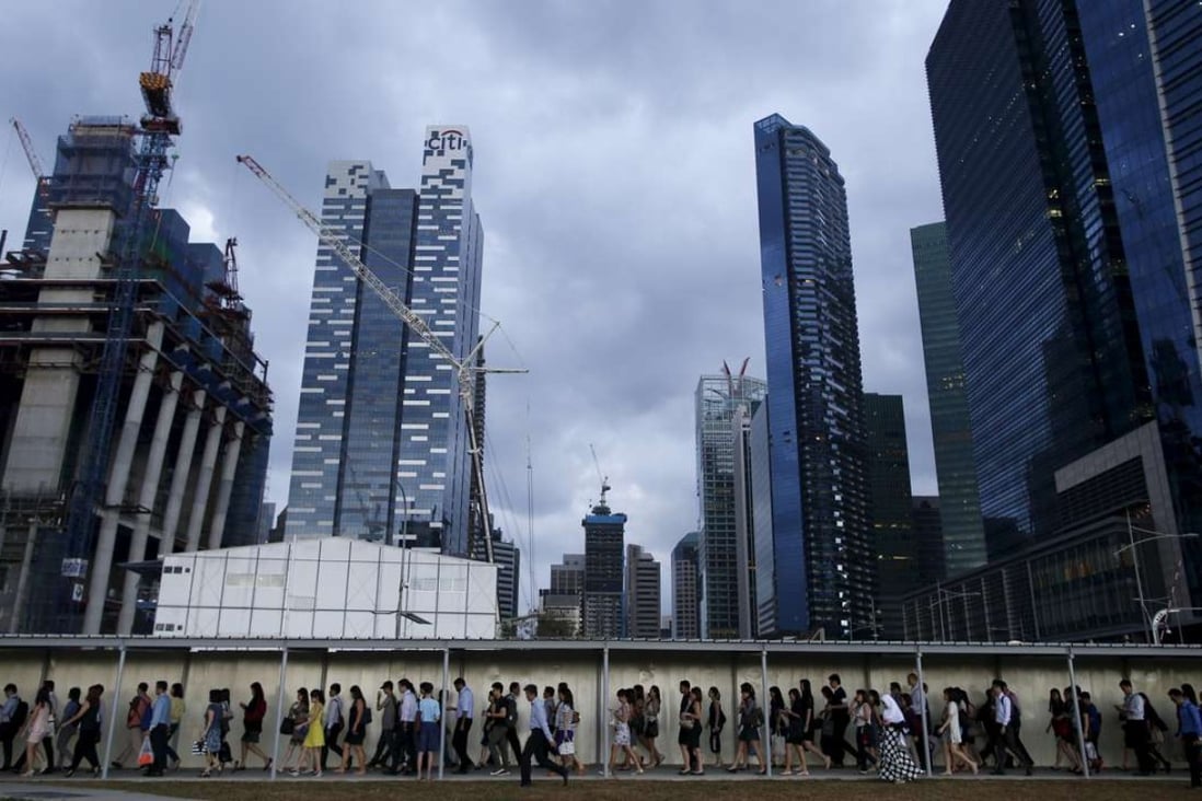 Singapore workers see 37 per cent of their wages go into the Central Provident Fund. Photo: Reuters