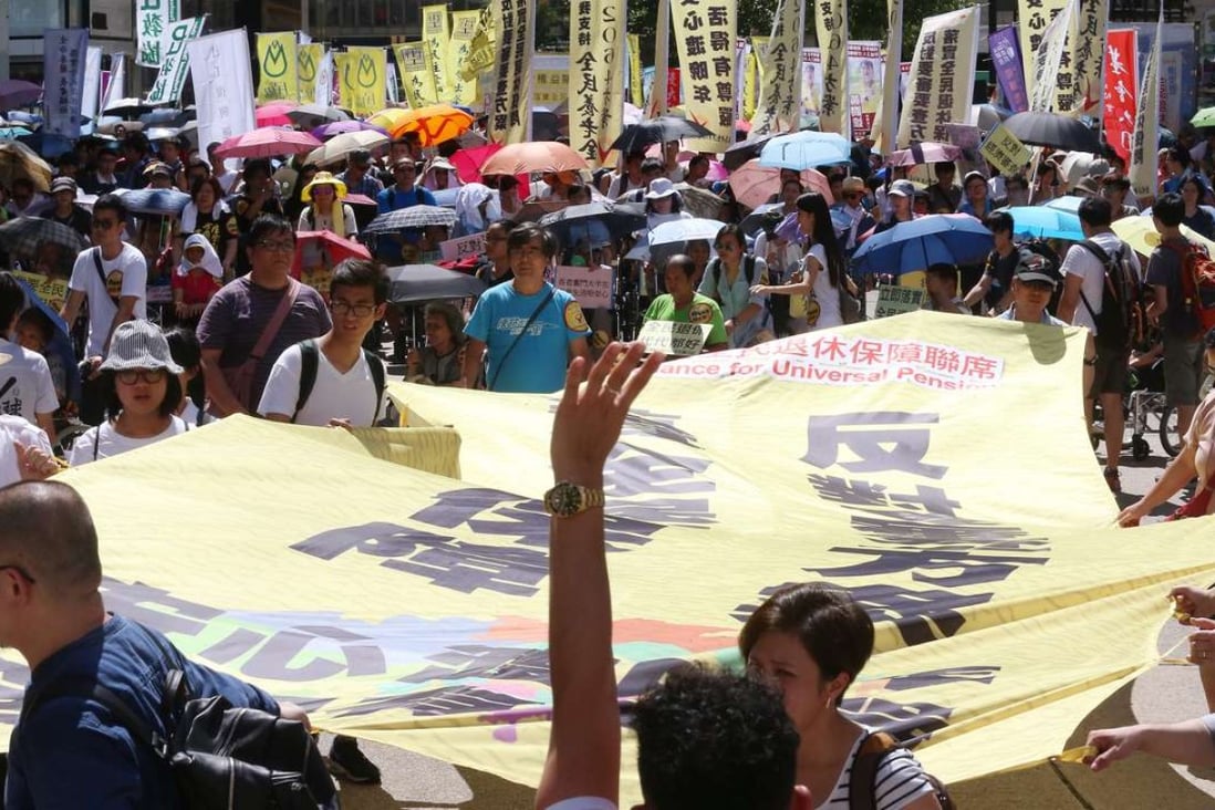 Members of the Alliance for Universal Pensions stage a march in Hong Kong. Photo: K.Y. Cheng
