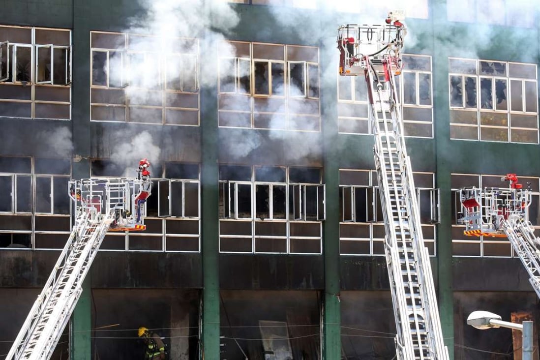 Two Hong Kong firemen died while tackling the inferno at the Ngau Tau Kok industrial building. Photo: Edward Wong