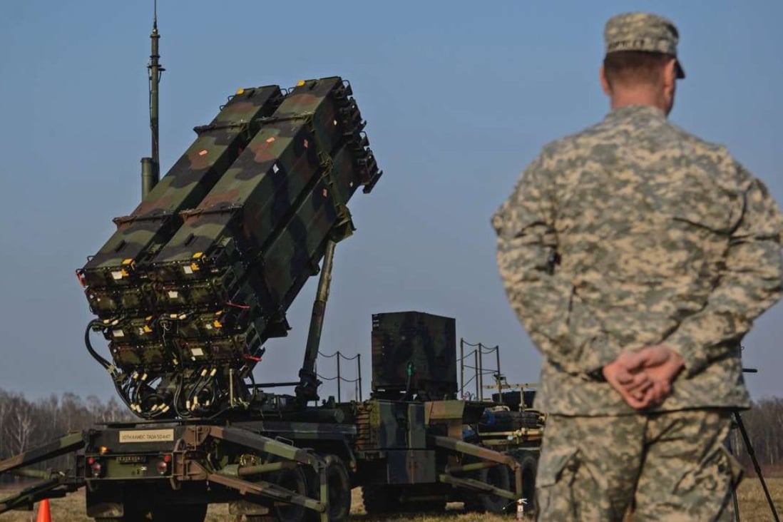 A US soldier stands behind a Patriot missile launcher – the kind of missile that Taiwan plans to test launch in the US in July. File photo: EPA