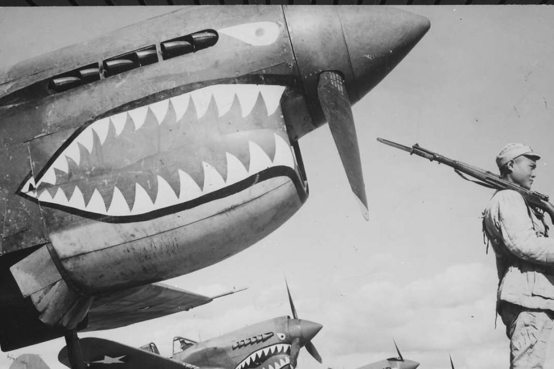 A Chinese soldier guards Flying Tigers aircraft.