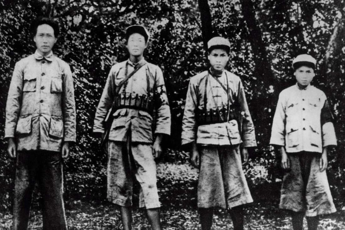 Mao Zedong (left) with Red Army soldiers in Ruijin, Jiangxi province, in November 1931.