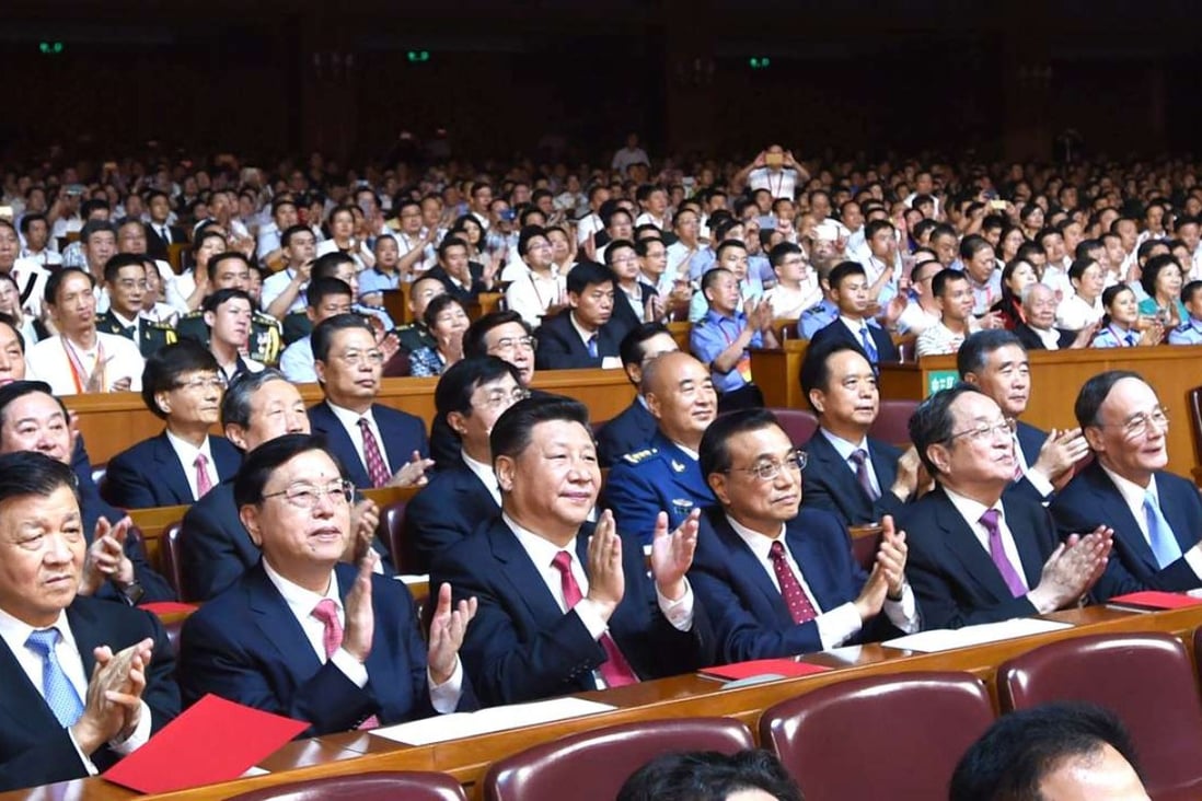 China’s President Xi Jinping (third from left) and other members of the Politburo Standing Committee attend a concert commemorating the Communist Party’s 95th anniversary. Photo: AP