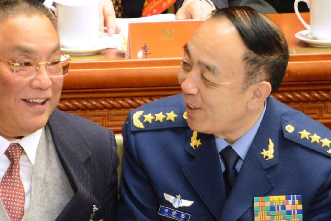 General Tian Xiusi(right) talks to Deng Pufang at the opening of the 18th Communist Party Congress at the Great Hall of the People in Beijing in 2012. Photo: AFP