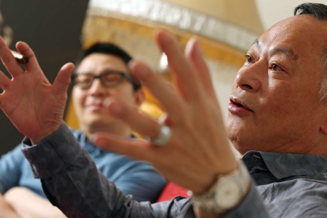 Film director Johnnie To (front) with his protege, producer-screenwriter Yau Nai-hoi. Photo: K.Y. Cheng