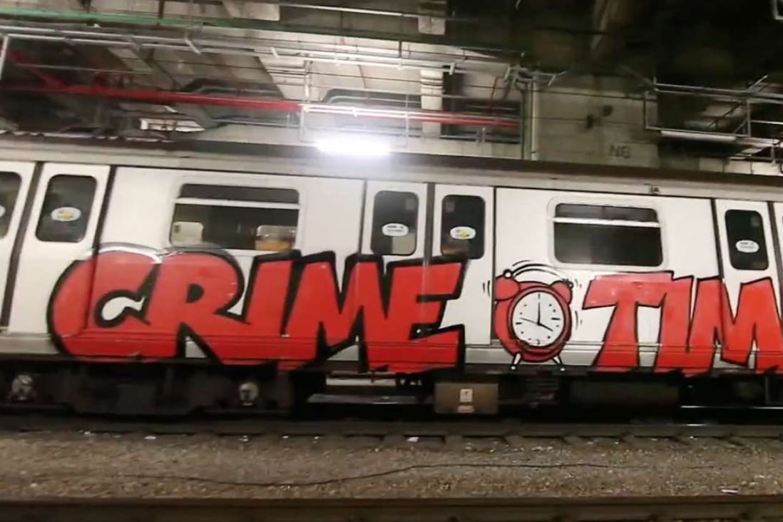 This undated image shows graffiti on an MTR train allegedly done by Danielle Bremner and her partner Jim Clay Harper, who call themselves Ether and Utah and claim to have been on a five-year mission of vandalisn and art.