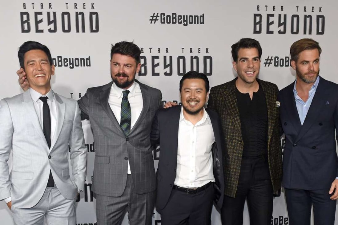 Star Trek Beyond director Justin Lin (centre) with the cast (from left) John Cho, Karl Urban, Zachary Quinto and Chris Pine in Sydney on July 7 for the Australian premiere of the film. Photo: EPA