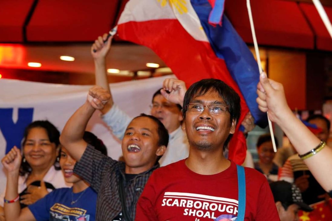 Activists from the Philippines celebrate after the UN ruling in favour of Philippines over the territorial dispute in the South China Sea. Photo: Reuters