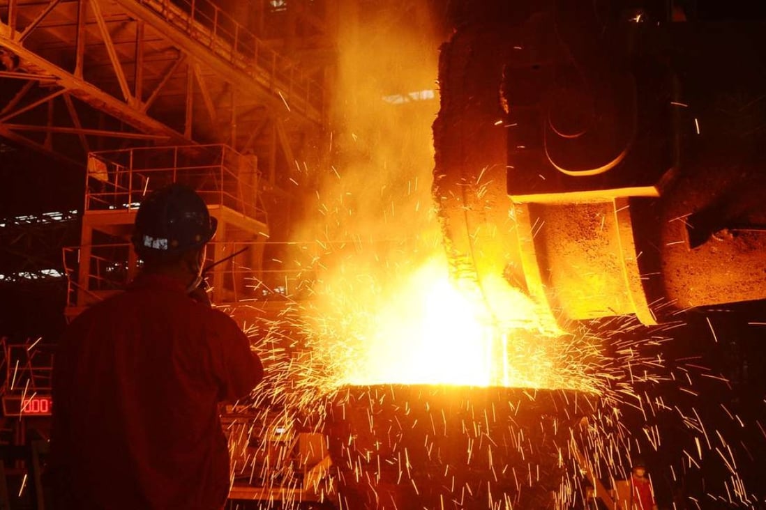 An employee works at a steel factory in Dalian, Liaoning province. Photo: Reuters
