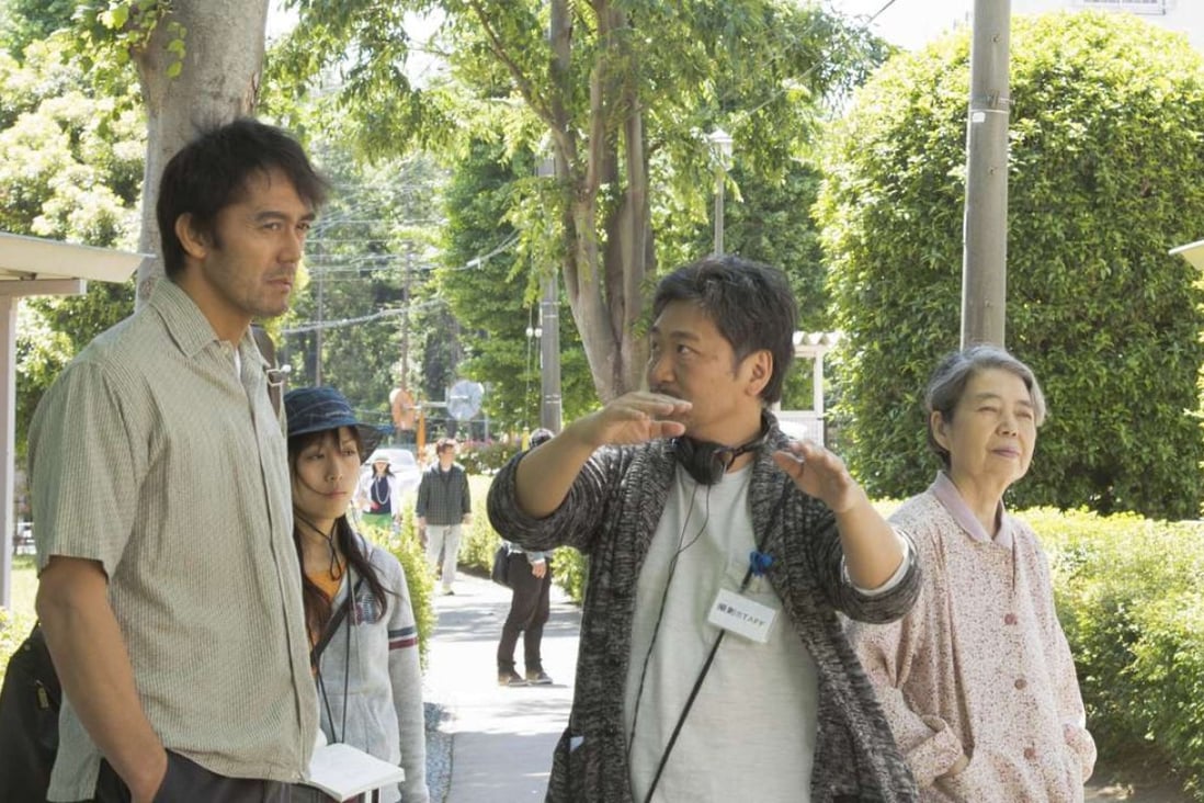 Hirokazu Koreeda (centre) directs Hiroshi Abe (left) and Kirin Kiki on the set of After the Storm.