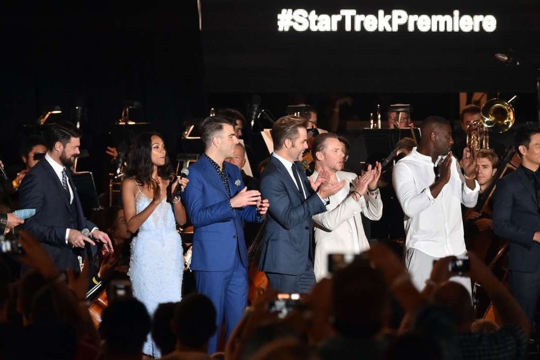 TV personality Conan O'Brien and actors Karl Urban, Zoe Saldana, Zachary Quinto, Chris Pine, Simon Pegg, Idris Elba, and John Cho speak onstage at the world premiere of the Paramount Pictures’ Star Trek Beyond. Photo: AFP