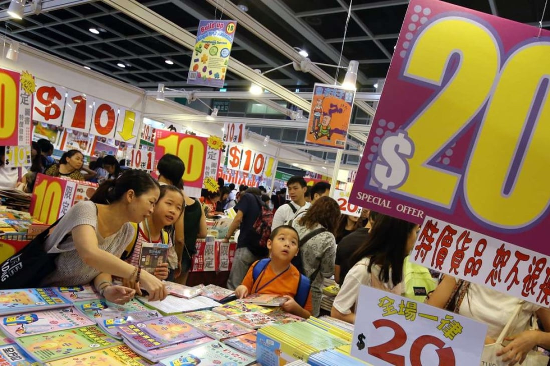Custom was brisk at the Hong Kong Book Fair at the Convention Centre in Wan Chai. Photo: Felix Wong