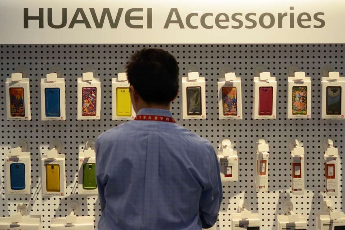 Huawei phone accessories on display at the 2013 International CES at the Las Vegas Convention Center. The world’s largest telecommunications equipment supplier now plans to open 15,000 new retail stores around the world this year. Photo: AFP