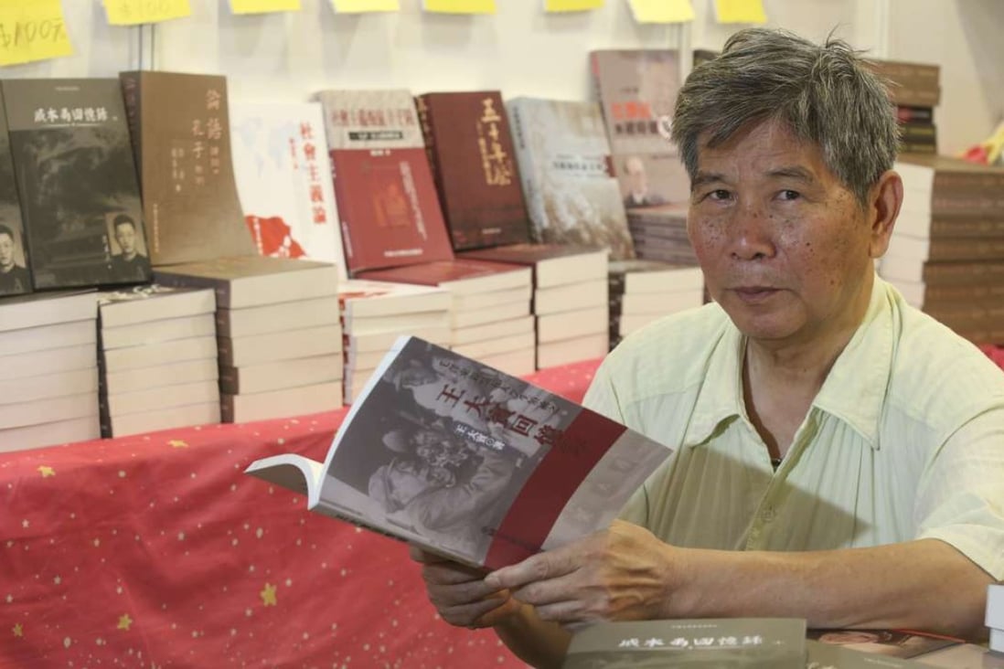 Bookseller Ao Benli, seen at the Hong Kong Book Fair, has spent the past five years running a publishing company devoted to the subject of the Cultural Revolution. Photo: Edward Wong