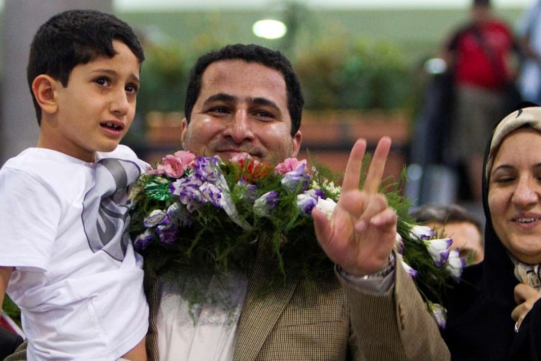 Iranian scientist Shahram Amiri with his family in 2010. Photo: Reuters