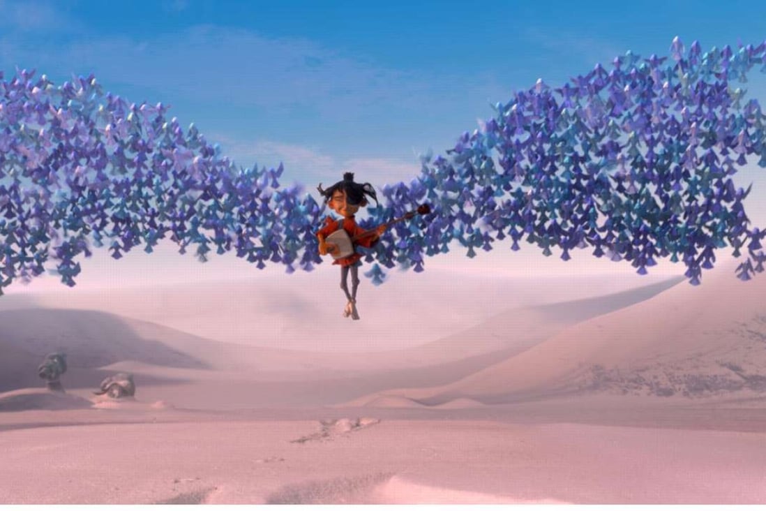 Kubo is swept up by origami wings in a still from Kubo and the Two Strings.