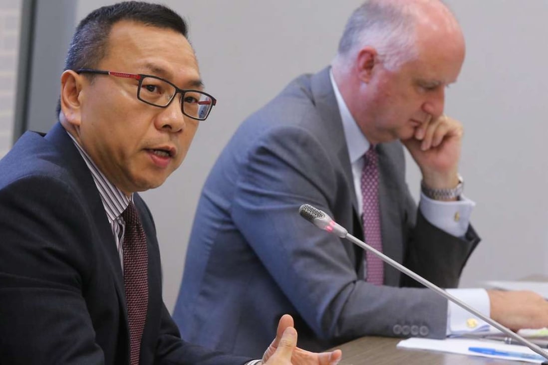 Brian Ho (left), executive director of the SFC’s Corporate Finance Division, and David Graham, chief regulatory officer and head of listing at HKEX, answer media queries regarding the joint consultation on listing regulatory structure on June 17. Photo: Dickson Lee