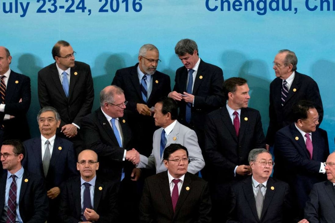 G20 finance ministers and central bank governors gather for a group photo on July 24 during two days of talks in Chengdu, Sichuan, ahead of the G20 leaders’ summit in Hangzhou. Photo: Reuters