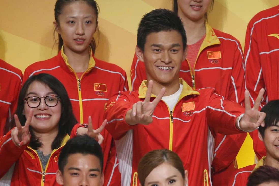 China swimmer Fu Yuanhui (second row, left) and swimmer Sun Yang (second row, left third) attend "A Date with Mainland Olympians" at Queen Elizabeth Stadium, Wan Chai. Photo: Felix Wong