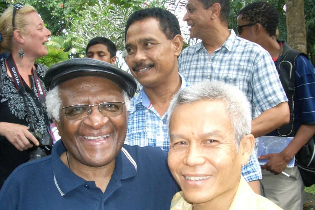 Sombath Somphone with Desmond Tutu in 2006. The US-educated Sombath, who headed a non-governmental organisation campaigning for sustainable development, went missing in 2012 while driving home in the capital Vientiane. Photo: sombath.org