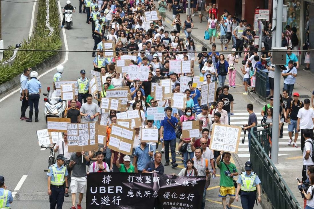 Uber supporters on a protest march in Macau on September 4. Photo: Dickson Lee