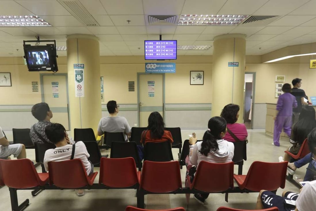 Patients and their relatives wait for their turn to be called at the surgical clinic in Kiang Wu Hospital in Macau. Photos: May Tse