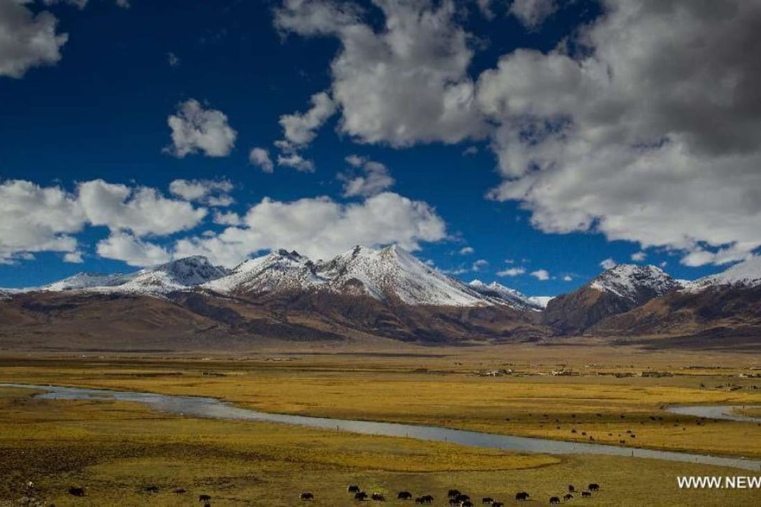 A file picture of clouds above mountains in Tibet. Photo: Xinhua