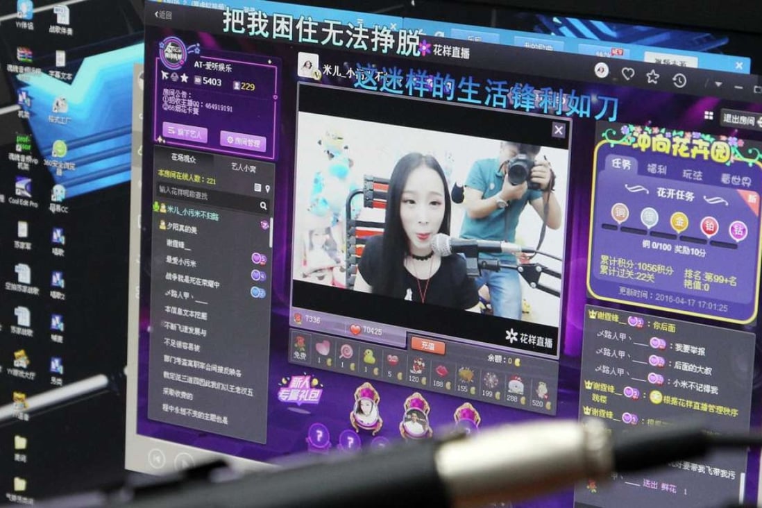 A computer screen shows “Xiao Mi”, an internet broadcast host, performing during a live-streaming session in Zhengzhou city in Henan province. Photo: ImagineChina