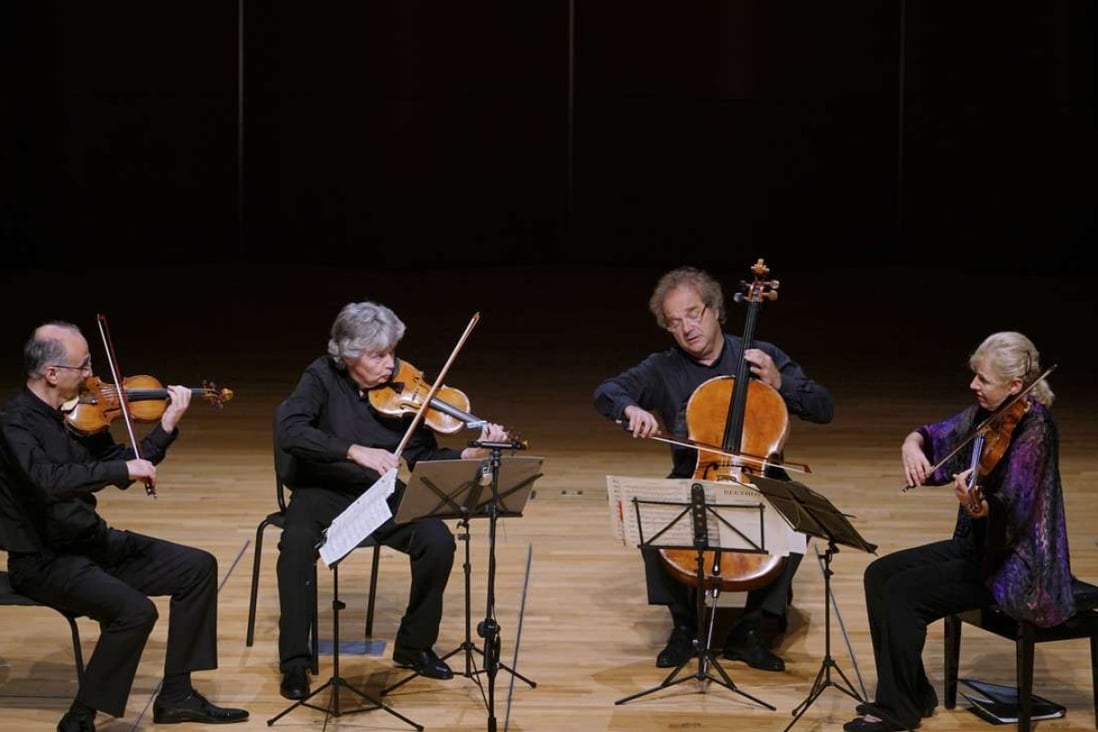 The Takács Quartet (from left) Edward Dusinberre, violin; Károly Schranz, violin; András Fejér, cello; and Geraldine Walther, viola, perform at the Grand Hall, Lee Shau Kee Lecture Centre, The University of Hong Kong.